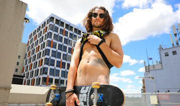 British skater Michael Kent naked on the Bentley Race roof